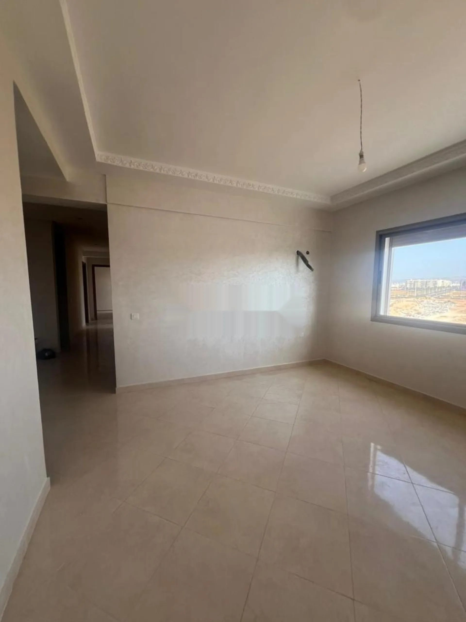 Appartement neuf de 3 chambres et garage