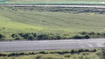 2.3 ha sur la route à Benslimane Zayda