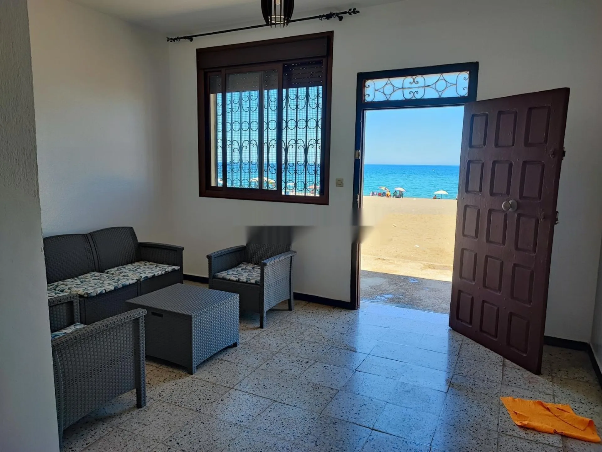 Directly in front of the sea house