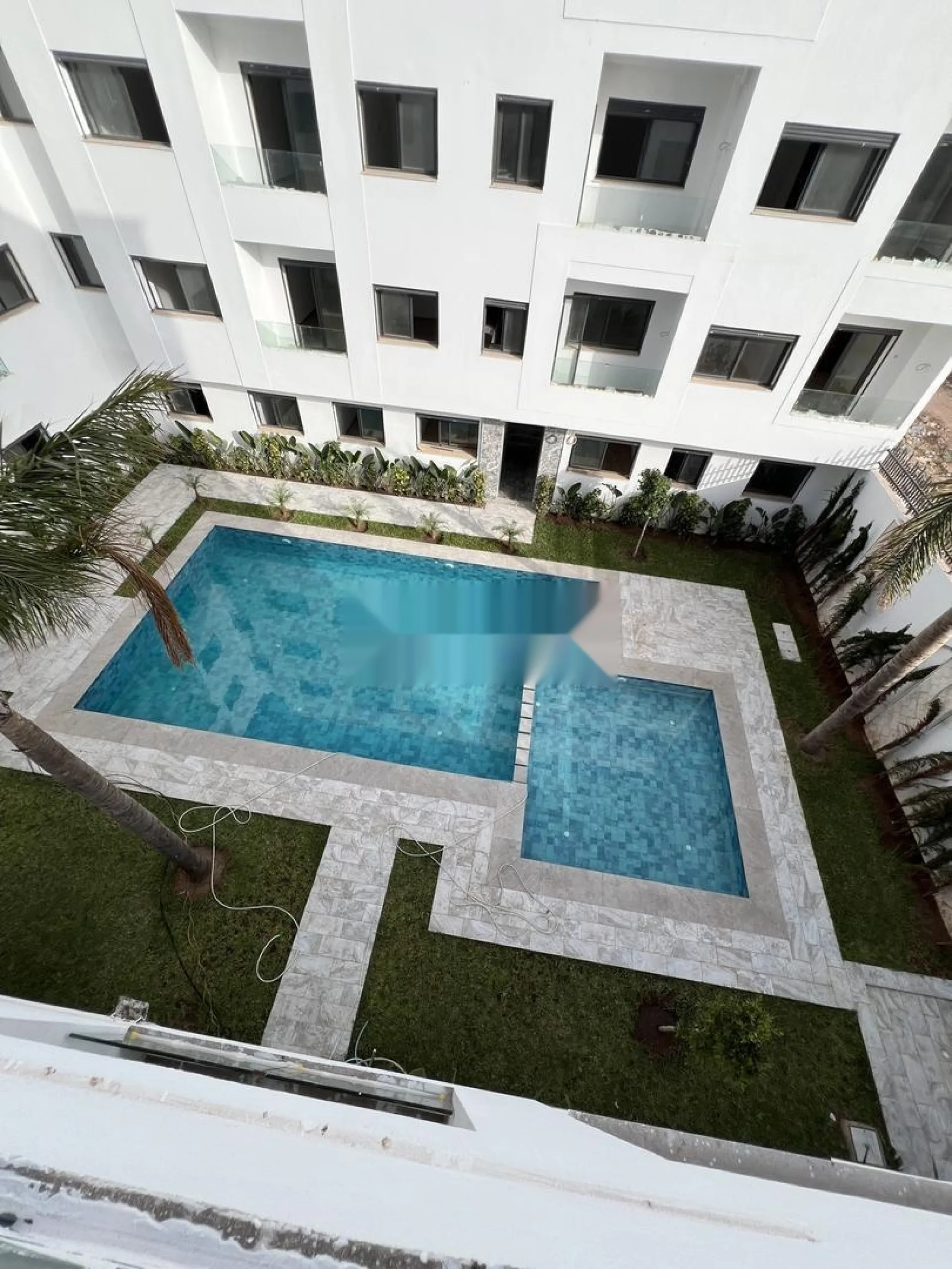 Appartements avec piscine et parking près de la mer