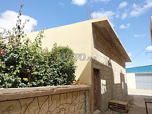 Maison trois façades