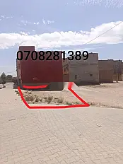 أرض بمساحة 100 متر مربع، ثلاث واجهات، حي النهضة