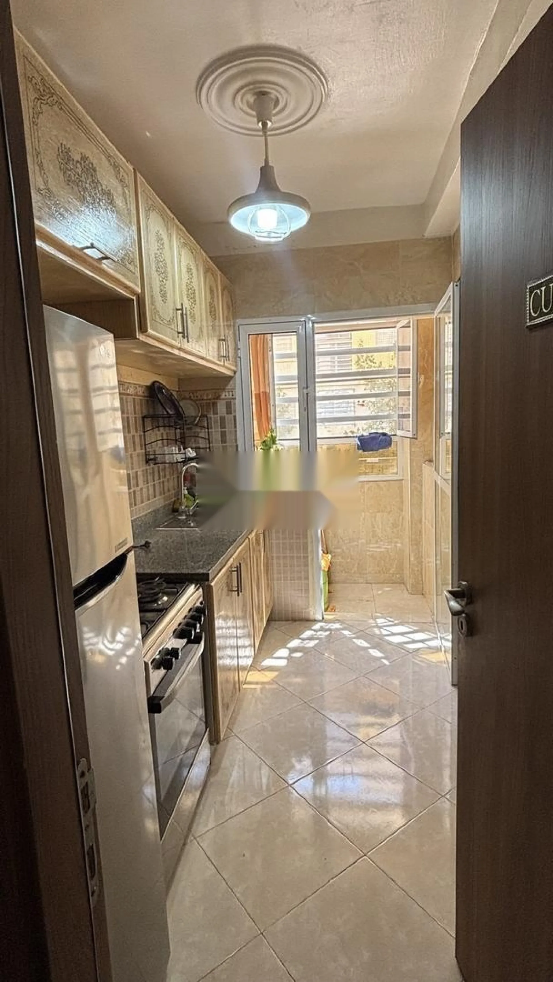 Appartement équipé, au rez-de-chaussée À louer