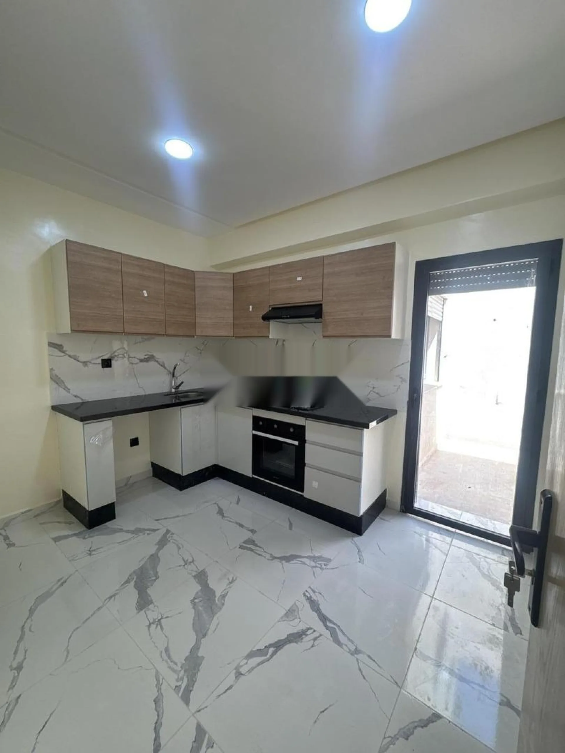 Appt 87m2 -11m2 de garage sous sol à Bouskoura